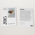 The 2015 Monthly Awards by Shoot The Frame lying flat, front cover and back cover side by side