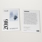 The 2016 Monthly Awards by Shoot The Frame lying flat, front cover and back cover side by side