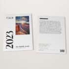 The 2023 Monthly Awards by Shoot The Frame lying flat, front cover and back cover side by side